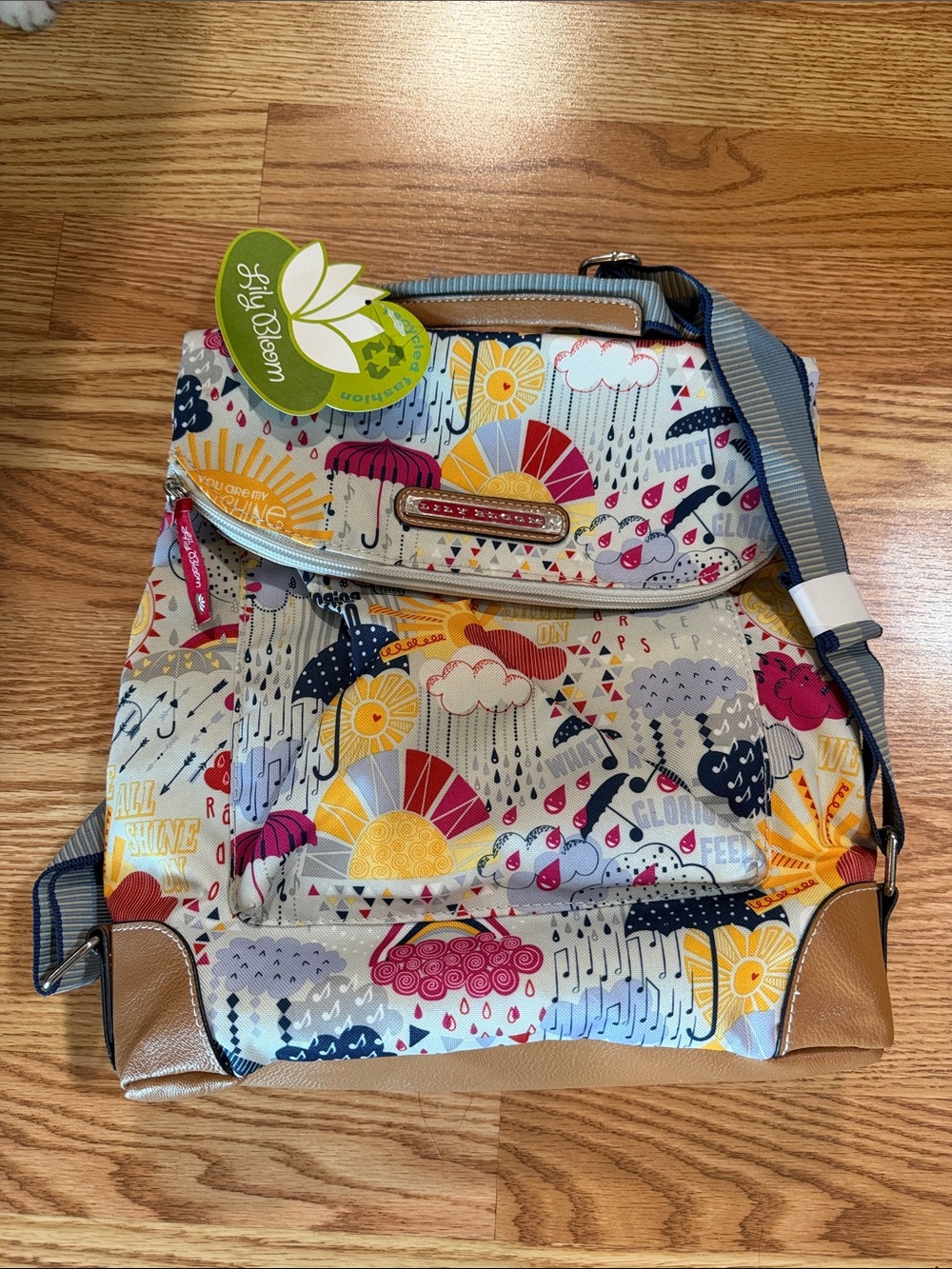 NWT!!!! Lily Bloom eco friendly Cream Multi-Color Rain & Sun Print Backpack